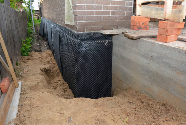 SJ Waterproofing Pros technician performing targeted Foundation Crack Repair assessment in Bailey, MI